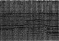 Figure 1.5-49  CMP stack as in Figure 1.5-48 with the additional step in the processing sequence for time-variant spectral whitening of the poststack data.