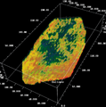 Figure 11.3-31  A 3-D view of the detrital sand level at approximately 850 ms from within the acoustic impedance volume derived from sparse-spike inversion as in Figure 11.3-29. Red represents high impedance values.