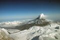 Ash from Mt. Redoubt, a remote volcano in Alaska, can threaten many aviation routes. U.S. Geological Survey/Photo by Game McGinsey