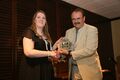 Ramona Niemann accepting the award on behalf of the Student Chapter